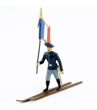 drapeau des chasseurs alpins en bleu horizon à skis