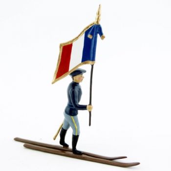 drapeau des chasseurs alpins en bleu horizon à skis