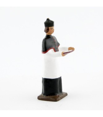 Chanoine portant la barette avec missel