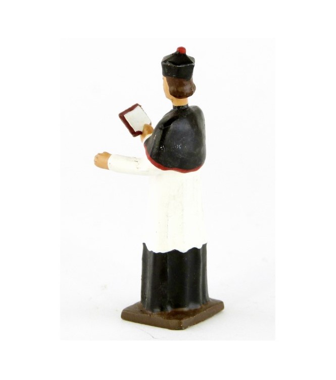 Chanoine portant la barette avec missel