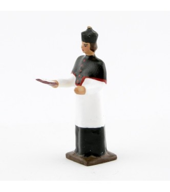 Chanoine portant la barette avec missel