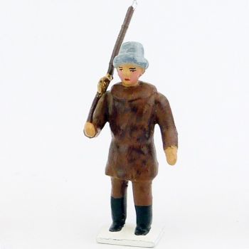 explorateur avec bonnet de fourrure, fusil sur l'épaule