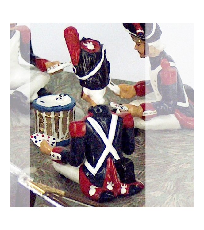 grenadier assis avec cartes