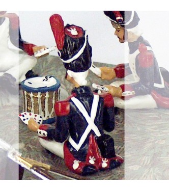 grenadier assis avec cartes