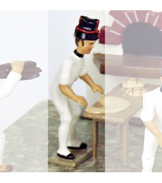 boulanger pétrissant le pain