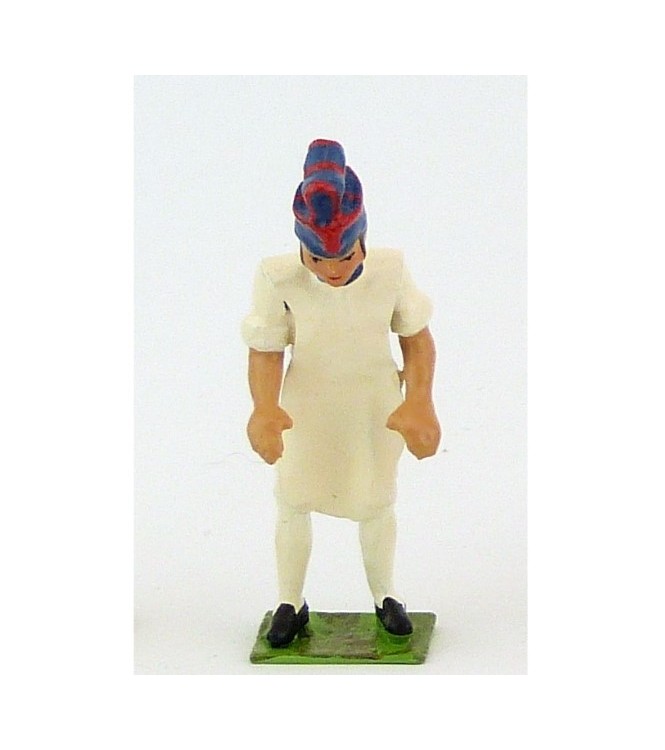 boulanger pétrissant le pain