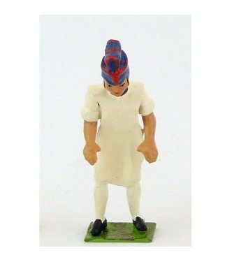 boulanger pétrissant le pain