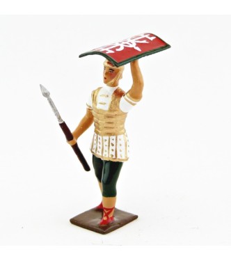 Romain avec bouclier au-dessus de la tête, uniforme blanc-or-vert, bouclier cad
