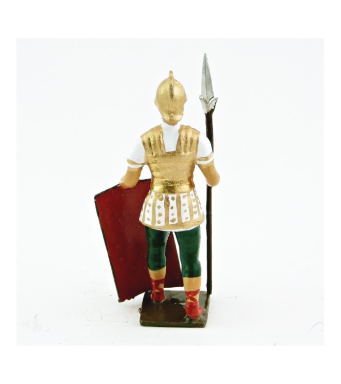 Romain bouclier posé au sol, uniforme blanc-or-vert, bouclier caducée à fond r