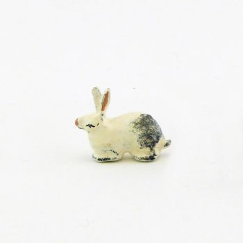 Lapin couché, blanc