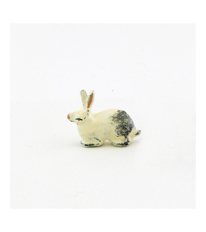 Lapin couché, blanc