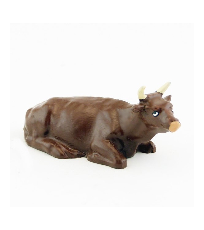 Vache marron (alezan) couchée