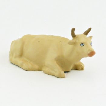 Vache beige couchée