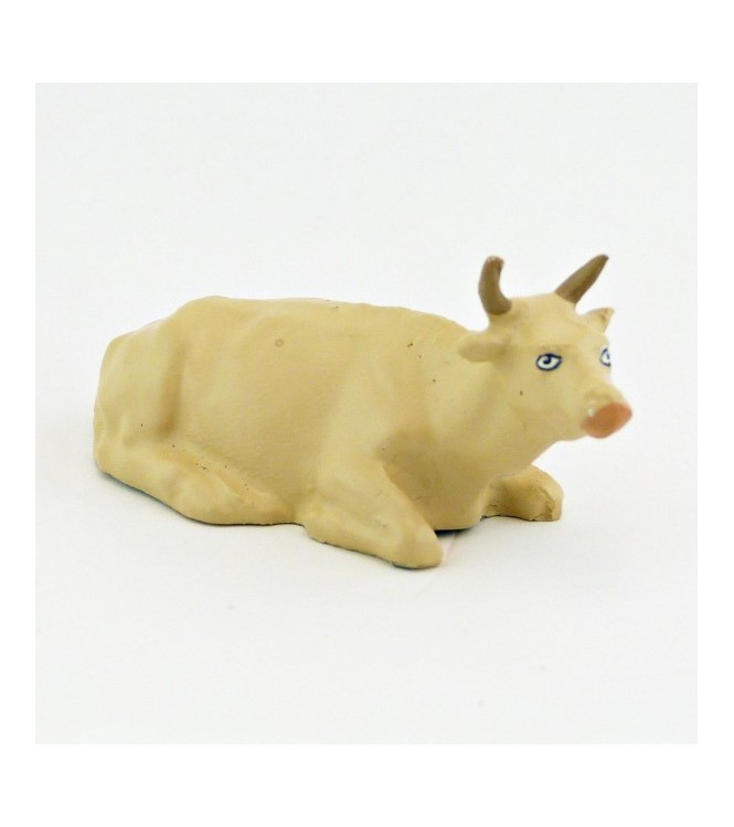Vache beige couchée