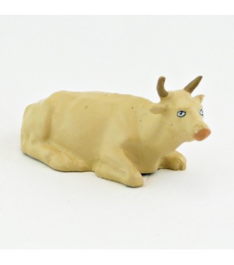 Vache beige couchée