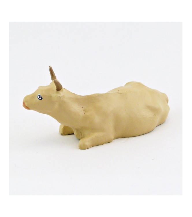 Vache beige couchée