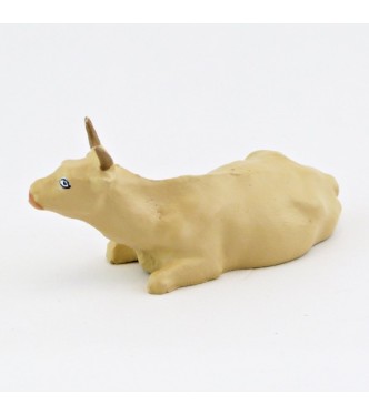 Vache beige couchée