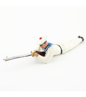 matelot des marins blancs couché, fusil en joue