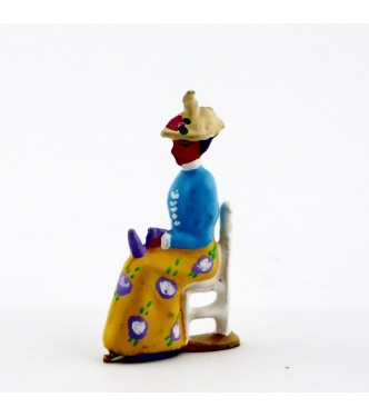 Femme assise en Bleu clair jaune
