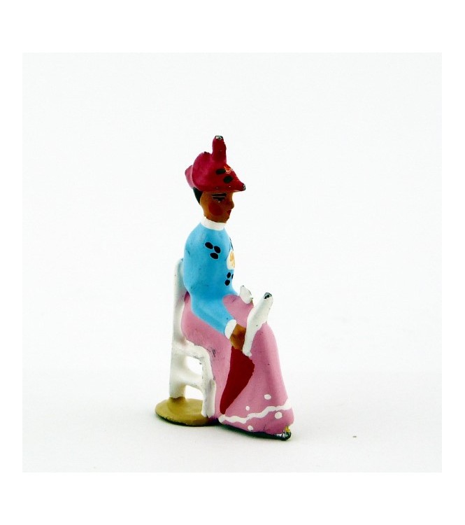 Femme assise en Bleu rose