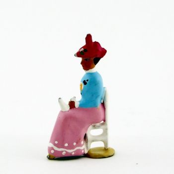 Femme assise en Bleu rose