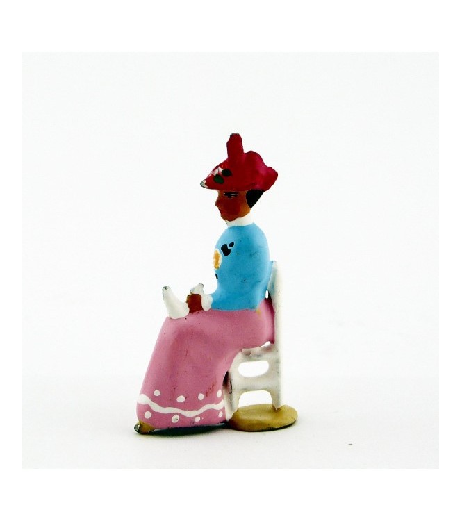 Femme assise en Bleu rose