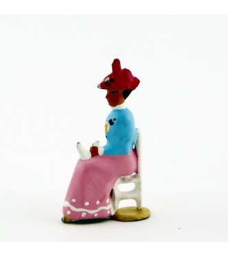 Femme assise en Bleu rose