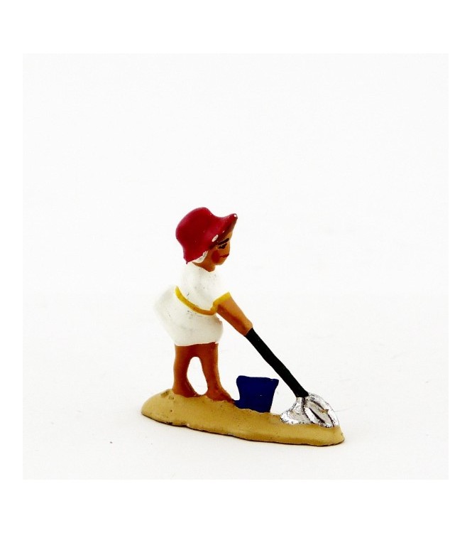 Petite fille   pelle en blanc