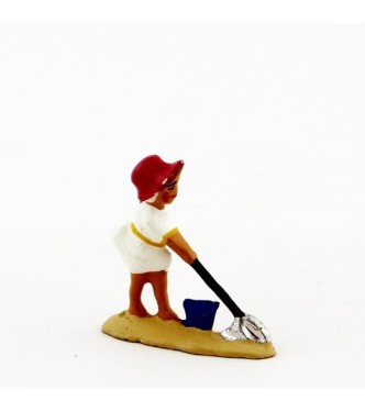 Petite fille   pelle en blanc