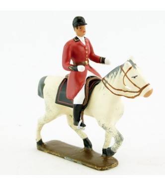 cavalier, redingote rouge, mains nues sur cheval au pas blanc