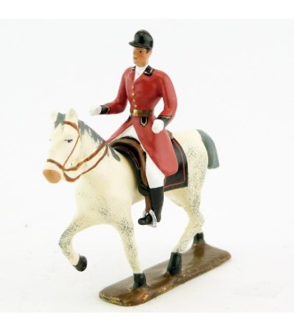 cavalier, redingote rouge, mains nues sur cheval au pas blanc