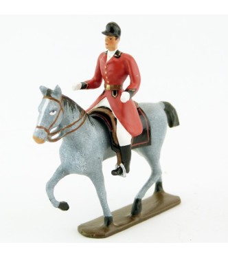 cavalier, redingote rouge, mains nues sur cheval au pas gris
