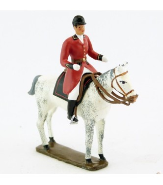 cavalier, redingote rouge, dague à la ceinture sur cheval blanc debout