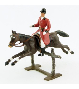 cavalier, redingote rouge, dague à la ceinture, sur cheval marron sautant barriè