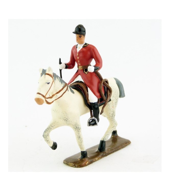 cavalier, redingote rouge, avec cravache (fouet à la ceinture) sur cheval blanc