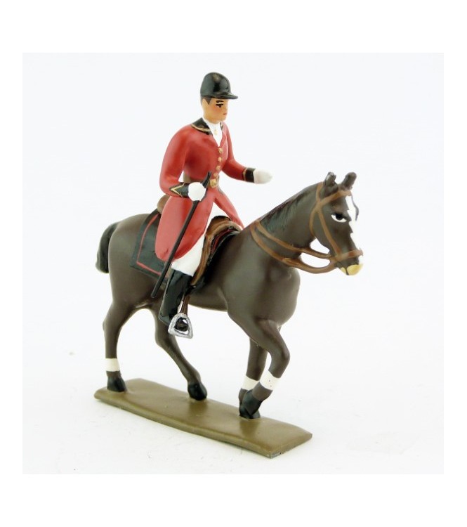 cavalier, redingote rouge, avec cravache (fouet à la ceinture) sur cheval marron