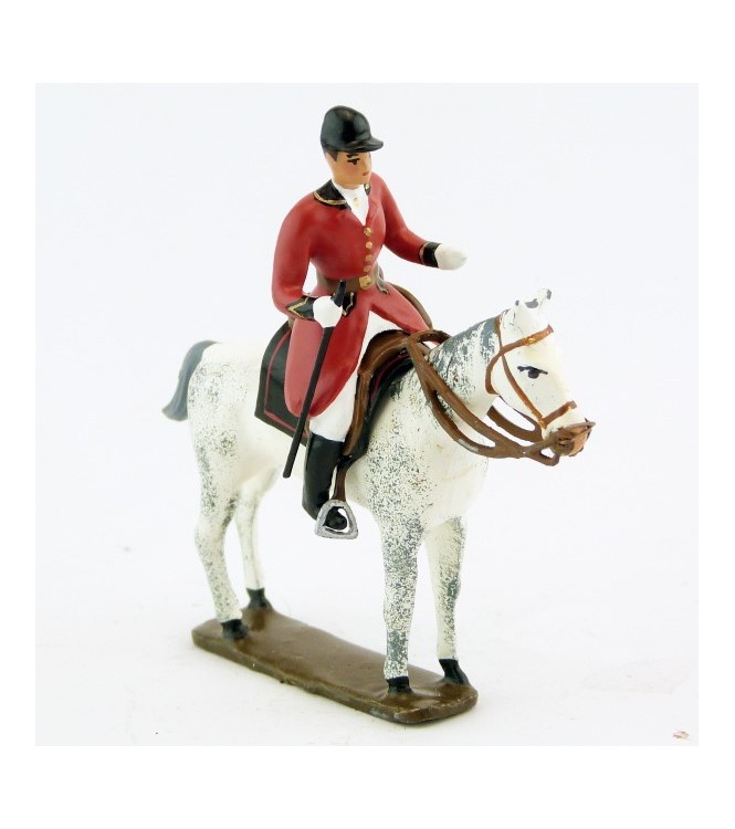 cavalier, redingote rouge,avec cravache sur cheval blanc debout