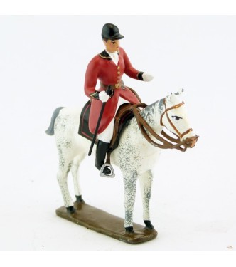 cavalier, redingote rouge,avec cravache sur cheval blanc debout