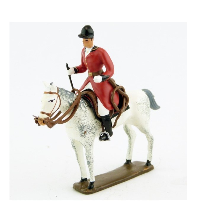 cavalier, redingote rouge,avec cravache sur cheval blanc debout