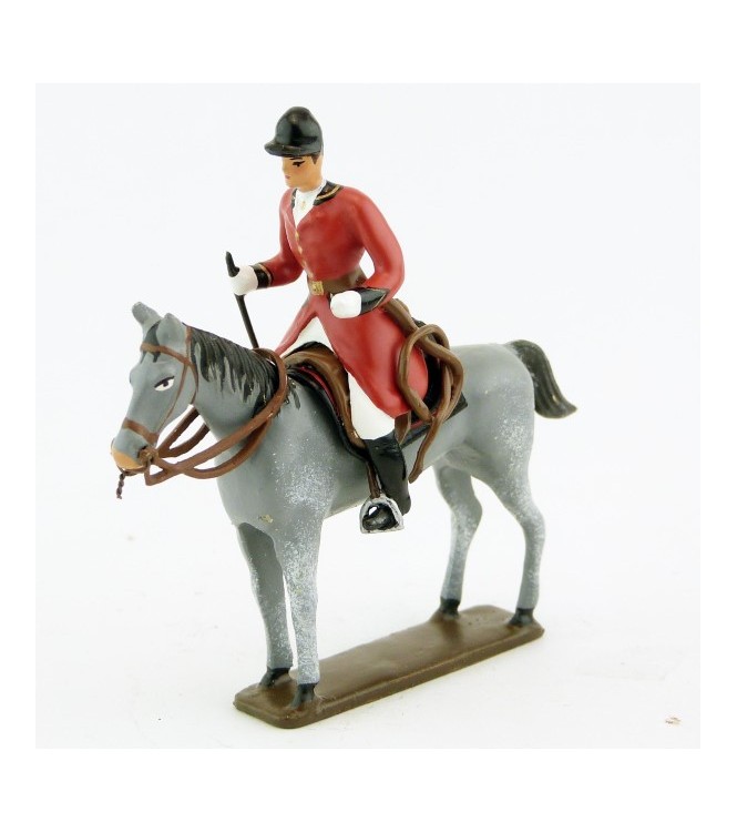 cavalier, redingote rouge,avec cravache sur cheval gris debout