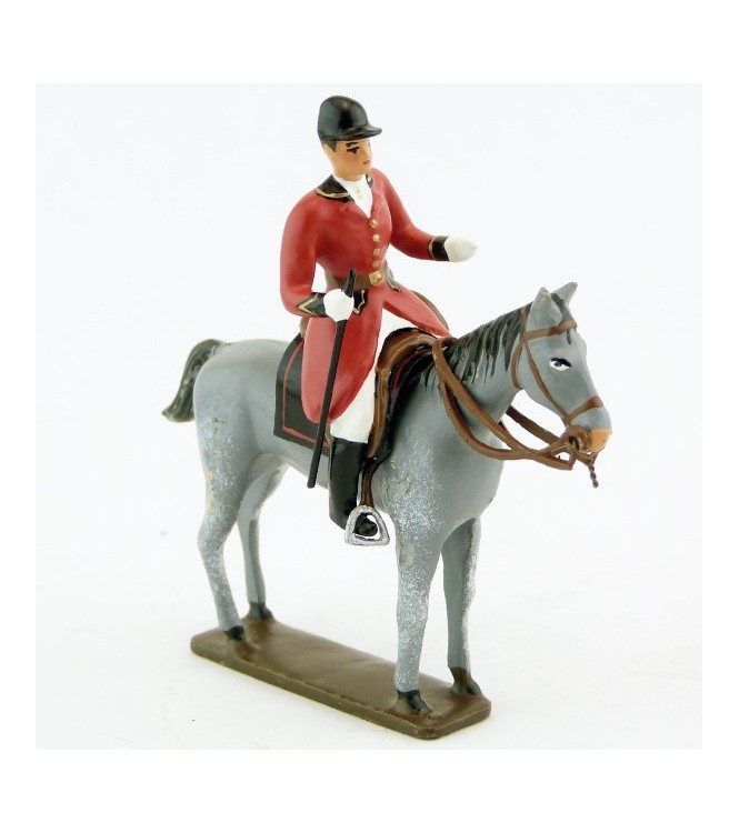 cavalier, redingote rouge,avec cravache sur cheval gris debout