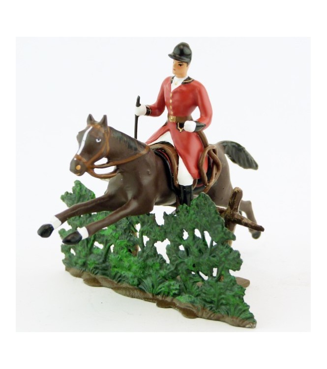 cavalier avec cravache sur cheval marron (bai) sautant haie + barrière