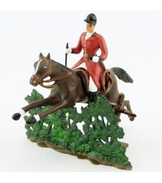cavalier avec cravache sur cheval marron (bai) sautant haie + barrière