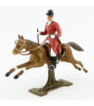 cavalier avec cravache sur cheval alezan au galop (sur tronc)