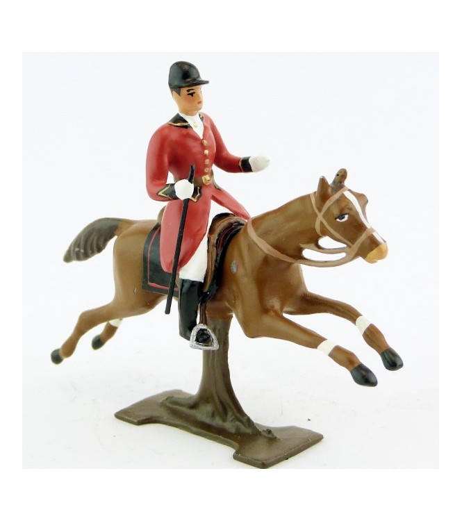 cavalier avec cravache sur cheval alezan au galop (sur tronc)