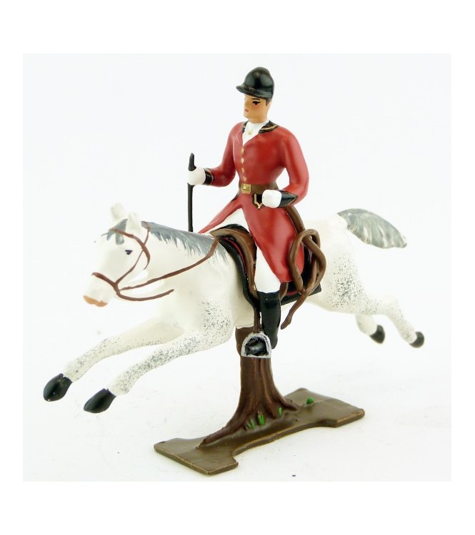 cavalier avec cravache sur cheval blanc au galop (sur tronc)