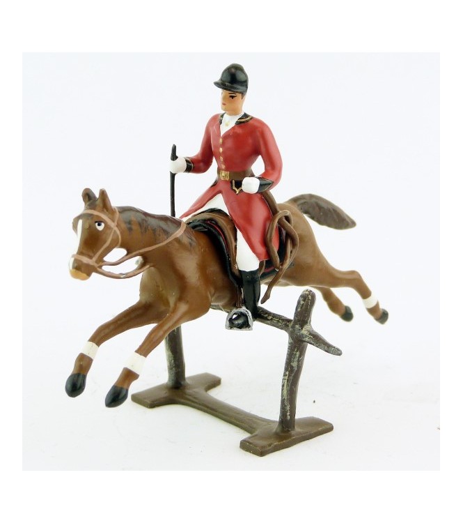 cavalier avec cravache sur cheval alezan sautant barrière