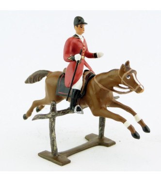 cavalier avec cravache sur cheval alezan sautant barrière