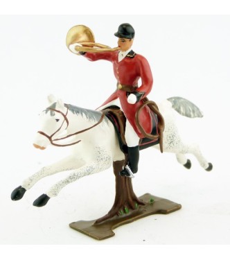 sonneur sonnant de la trompe sur cheval blanc au galop (sur tronc)