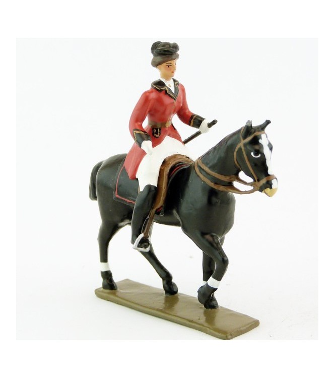 cavalière (cravache) sur cheval noir au pas